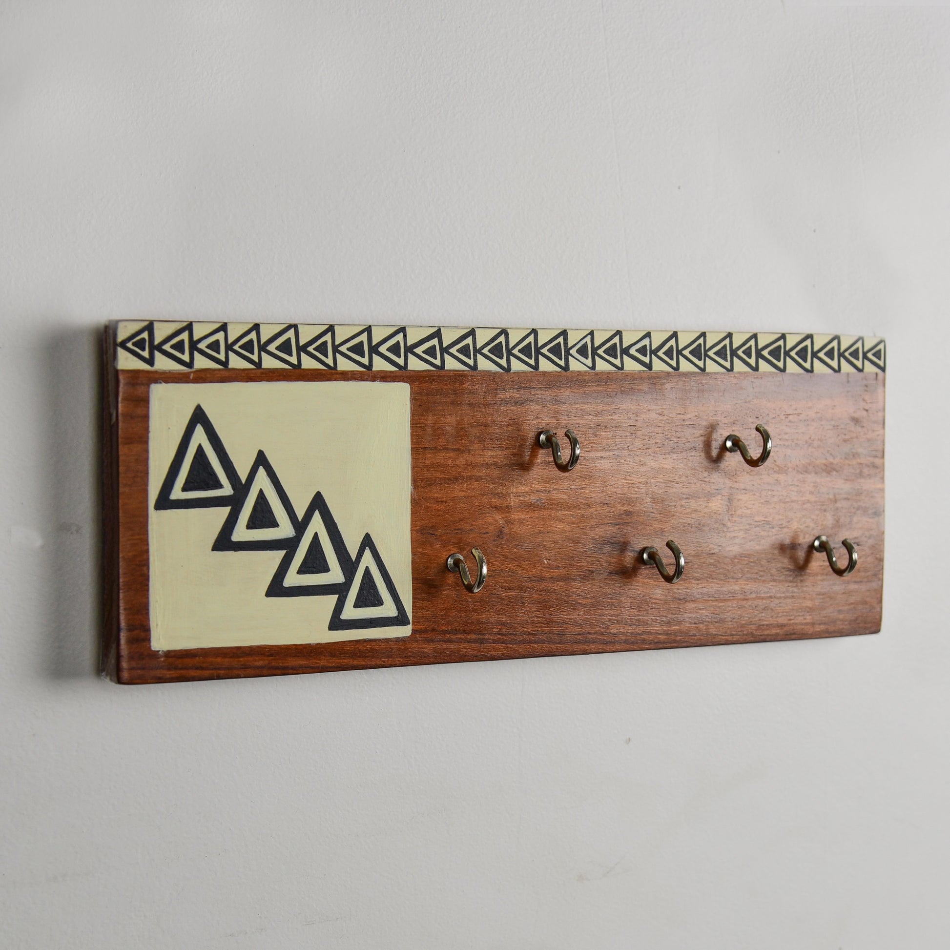 Handcrafted Wooden Decorative Key Holder In White And Black Color